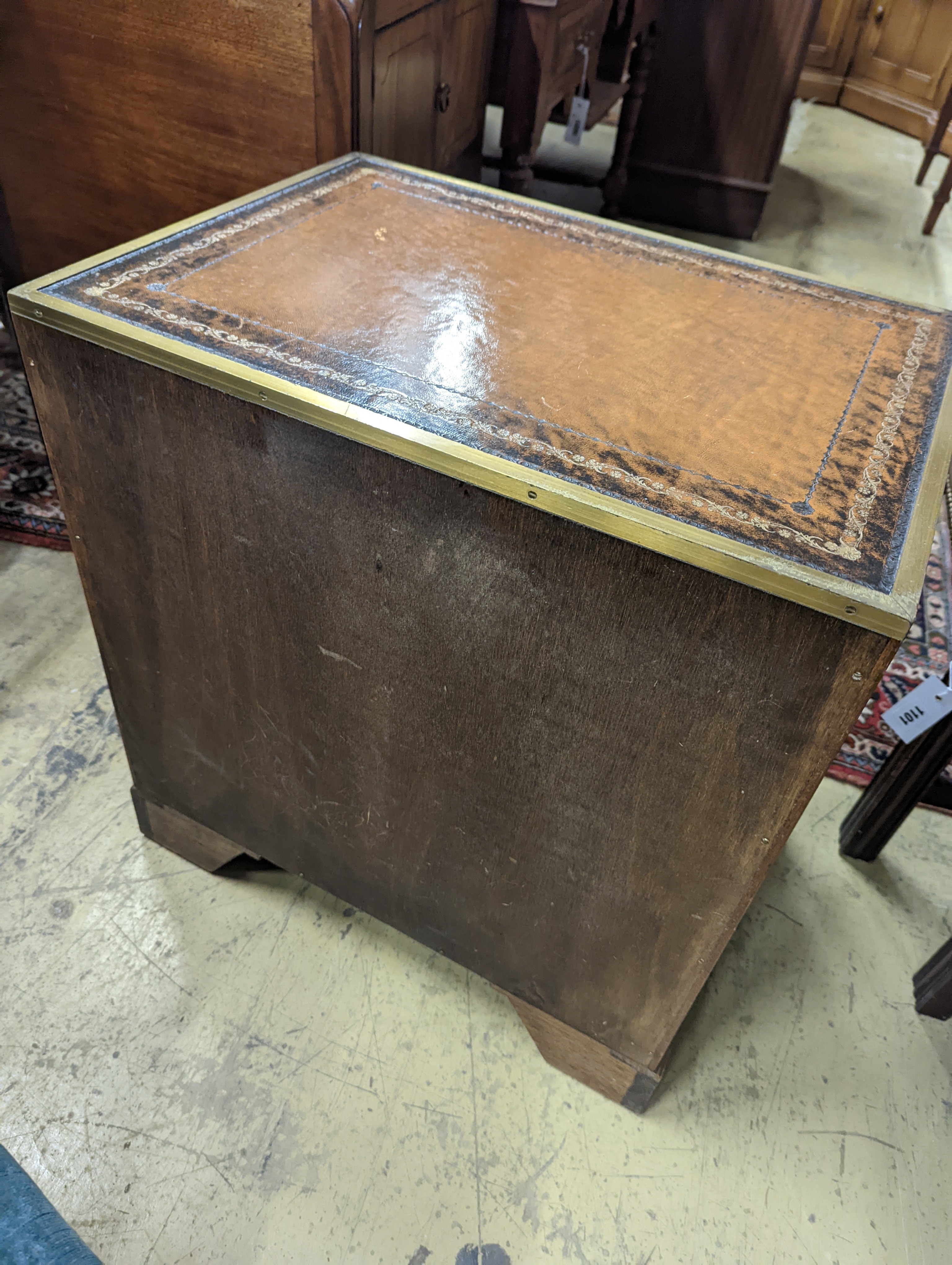 A pair of reproduction brass mounted military style yew veneered bedside chests with leather inset tops, width 56cm, depth 40cm, height 60cm